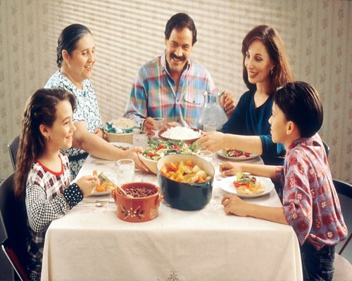 Family enjoying a calm dinner at home